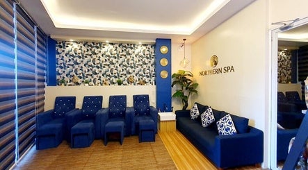 Luxe seating area at Northern Spa - Cabanatuan City, Central Luzon, PH, featuring modern decor and plush chairs.