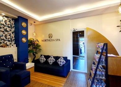 Elegant Northern Spa lobby in Cabanatuan City, Central Luzon, PH featuring stylish seating and decor.