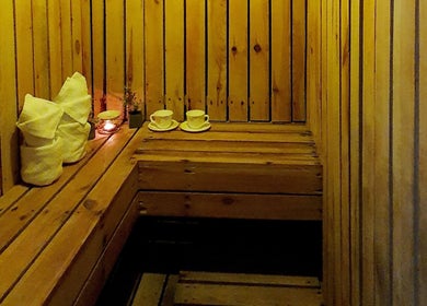 Relaxing sauna at Northern Spa - Cabanatuan City with wooden benches and soft lighting in Central Luzon, PH.