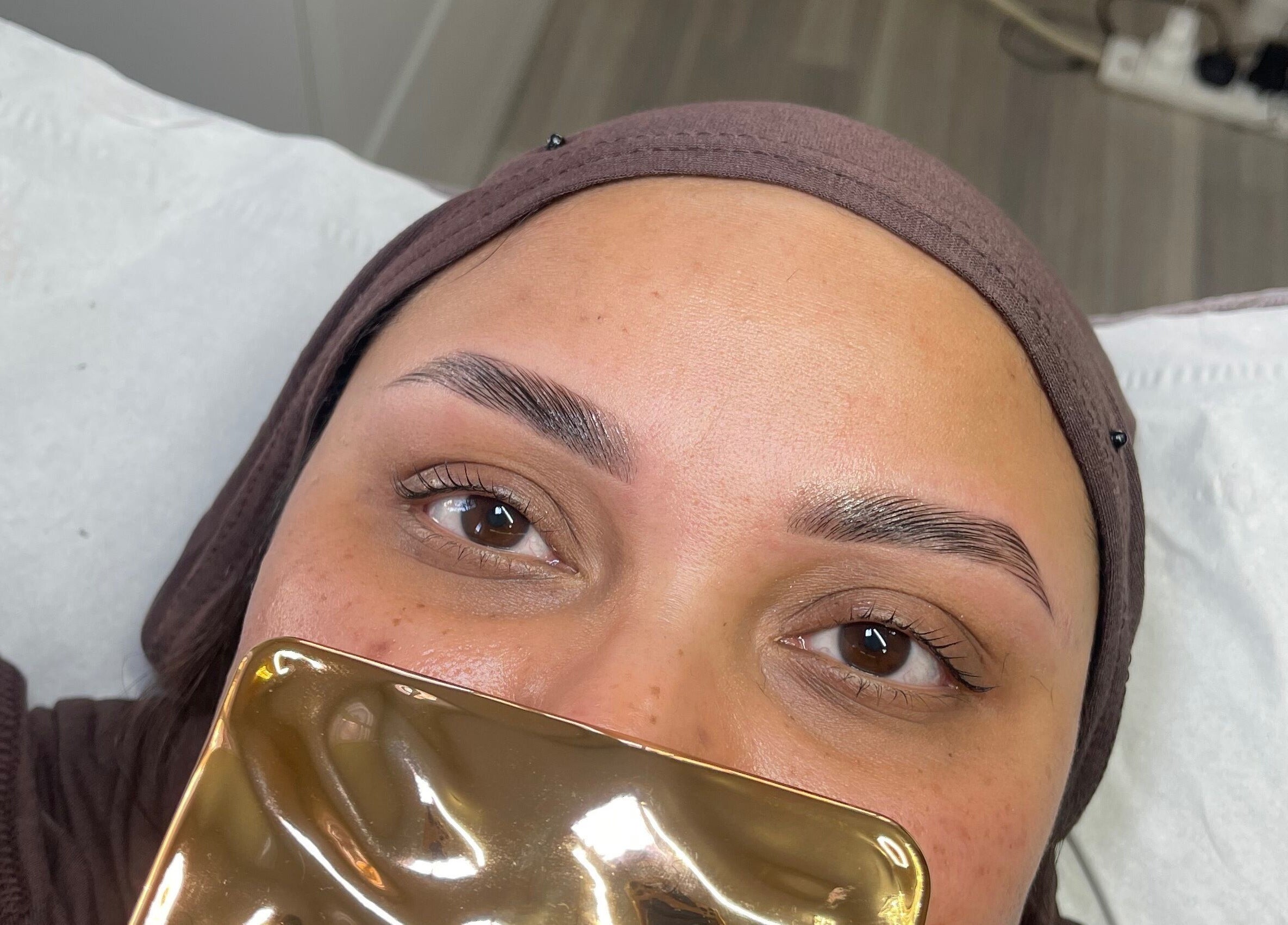 Close-up of freshly groomed eyebrows at M.Y Belle, Glasgow, Scotland, GB. Perfect brow enhancement in relaxing ambiance.