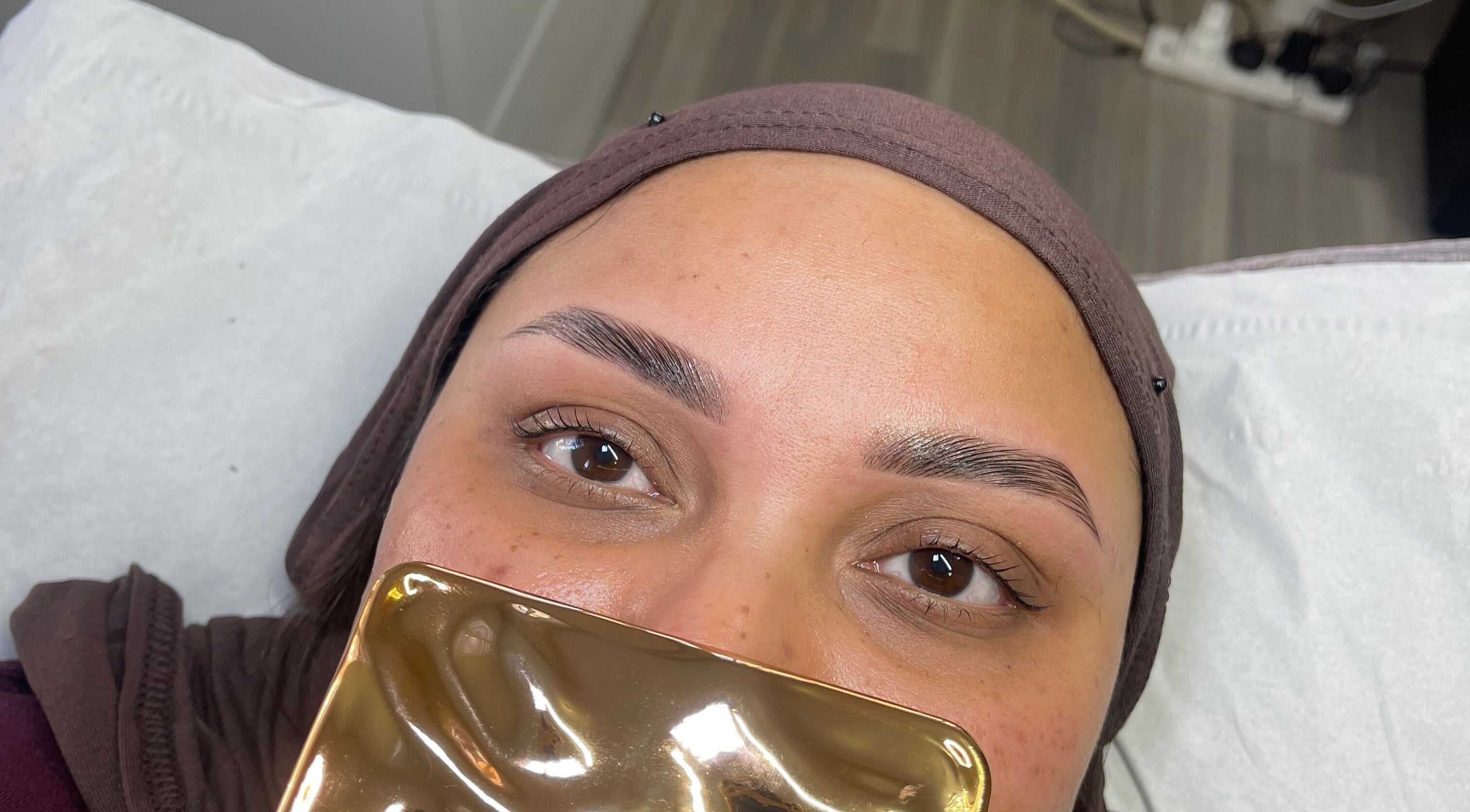 Close-up of freshly groomed eyebrows at M.Y Belle, Glasgow, Scotland, GB. Perfect brow enhancement in relaxing ambiance.