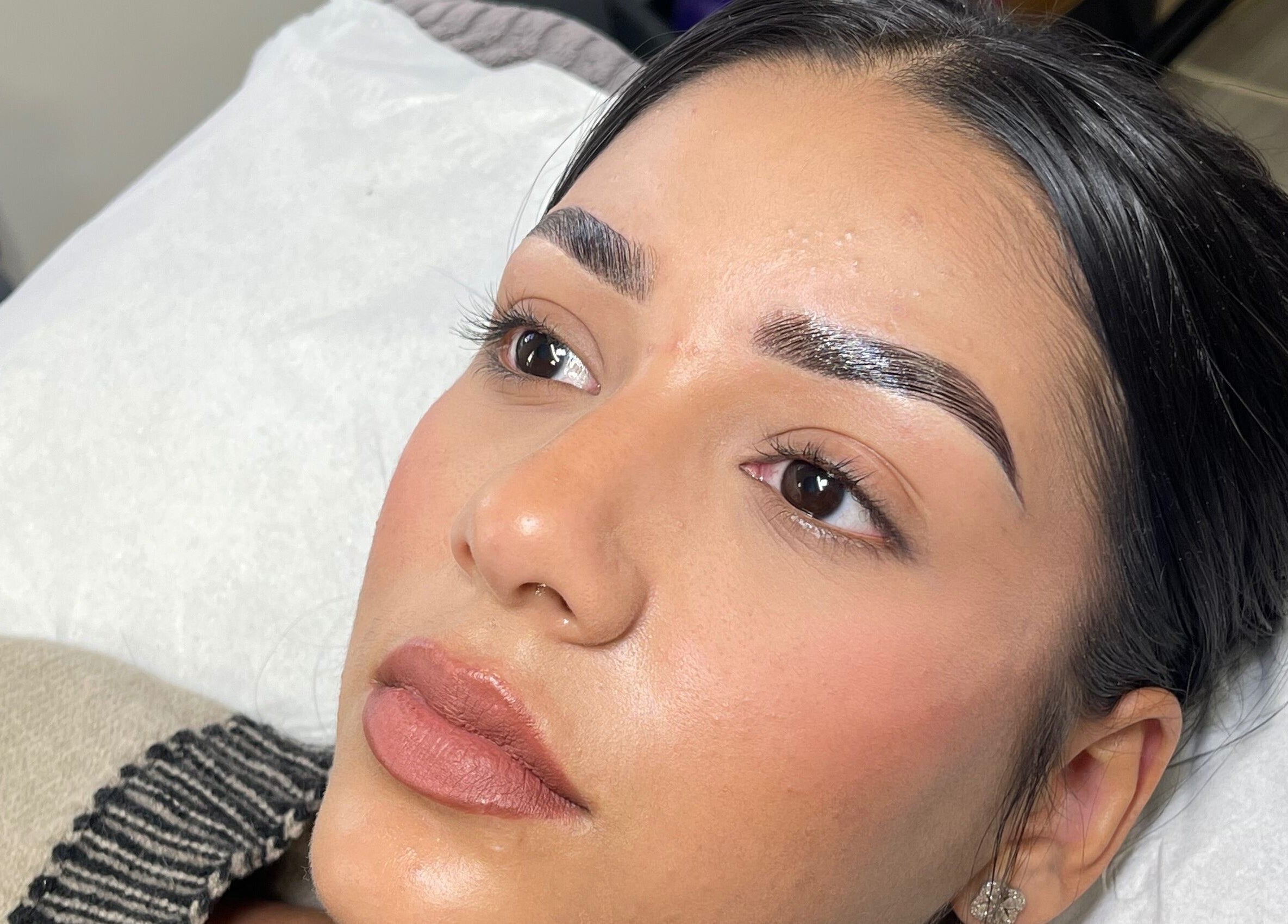 Close-up of a client's beautifully shaped brows at M.Y Belle, Glasgow, Scotland, GB.