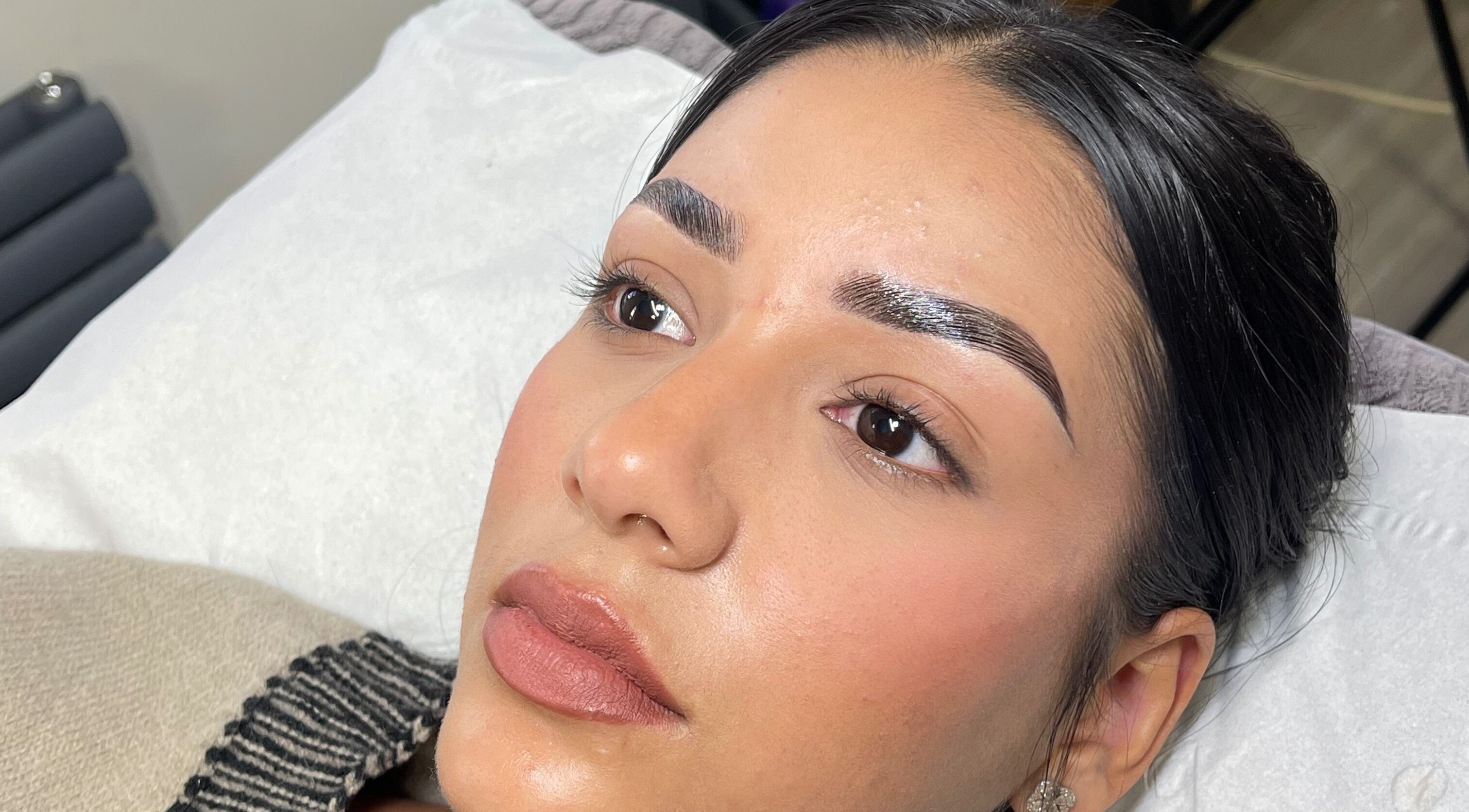 Close-up of a client's beautifully shaped brows at M.Y Belle, Glasgow, Scotland, GB.