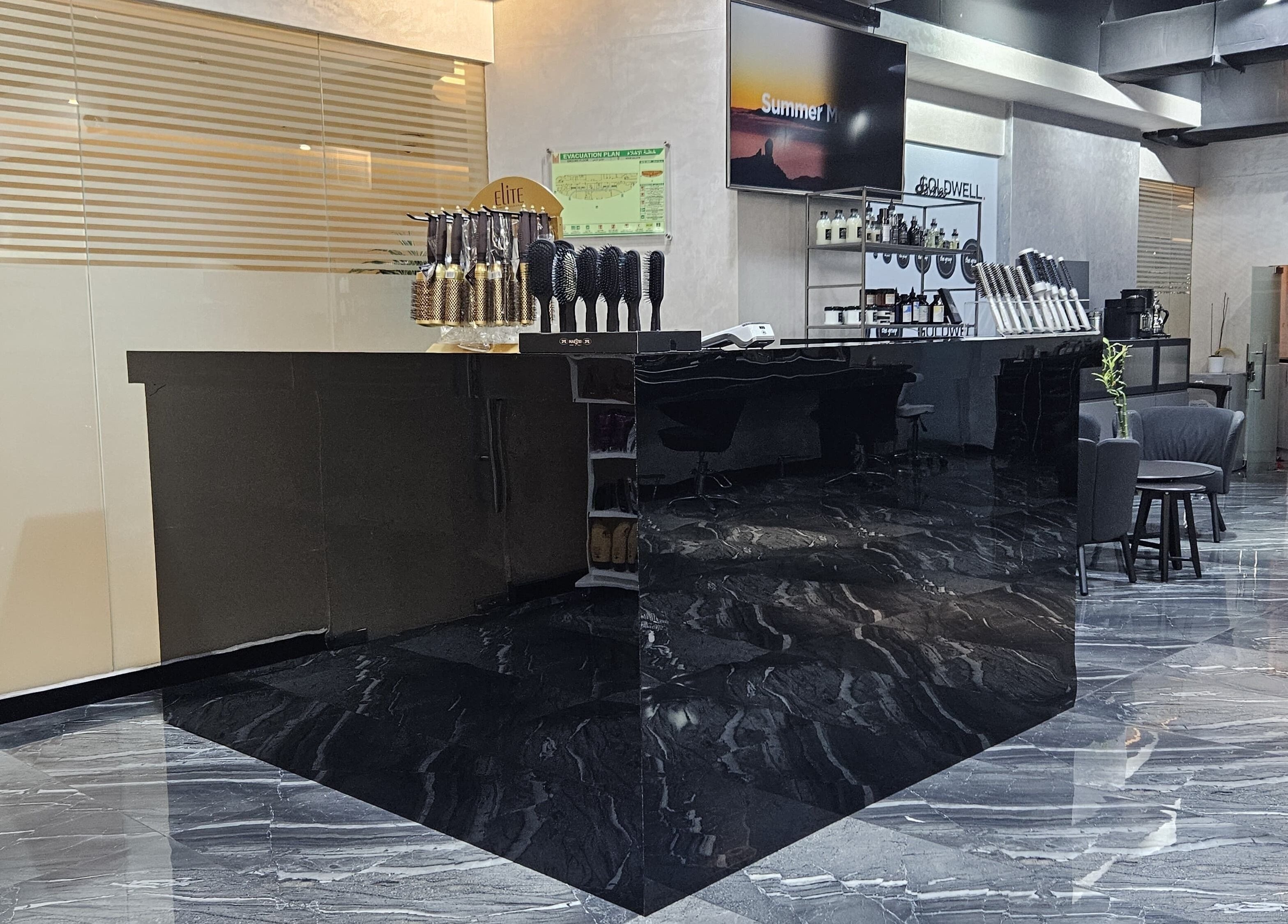 Modern reception area at Flair Beauty Salon, Abu Dhabi, AE, showcasing sleek design and luxurious amenities.