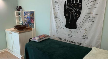 Relaxing therapy room at Jane Sandford at Looe Wellness Centre, Looe, England, GB, featuring calming decor.