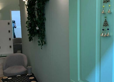 Relaxing interior at Jane Sandford at Looe Wellness Centre, Looe, England, GB featuring calming green decor.