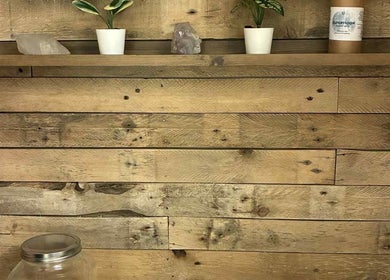 Rustic wooden shelves with crystals at Jane Sandford Hypnotherapy and Holistic Health in Liskeard, England, GB.