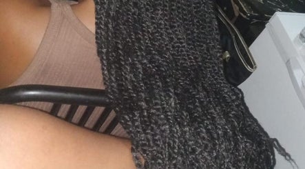 Intricate braiding hairstyle at Nash&Zeco's all in one business's, Roseau, Saint George Parish, DM.