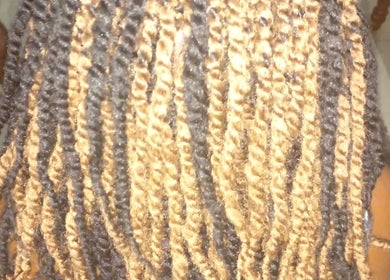 Intricate braided hairstyle at Nash&Zeco's all in one business's, Roseau, Saint George Parish, DM.