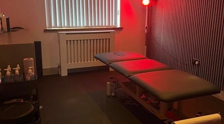 Relaxing massage room at Active Life Massage Therapy, Carrickfergus, Northern Ireland, GB, with ambient lighting.