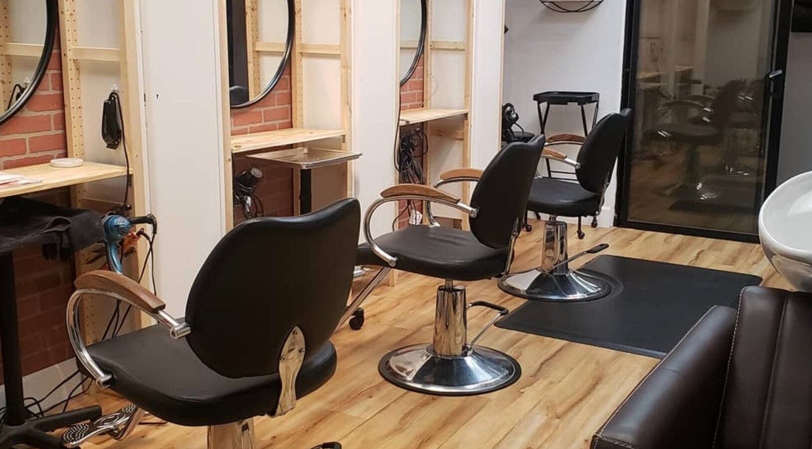 Modern salon chairs at Chemically Dependent, Chandler, Arizona, US, offering premium beauty services.