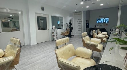 Interior of Ann Shane Hair Beauty Salon in Petaling Jaya, Selangor, MY featuring modern chairs and serene atmosphere.