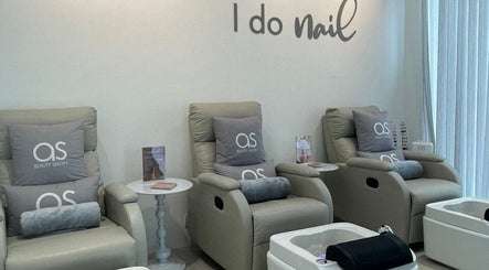 Stylish nail salon at Ann Shane Hair Beauty Salon, Petaling Jaya, Selangor, MY, featuring plush pedicure chairs.