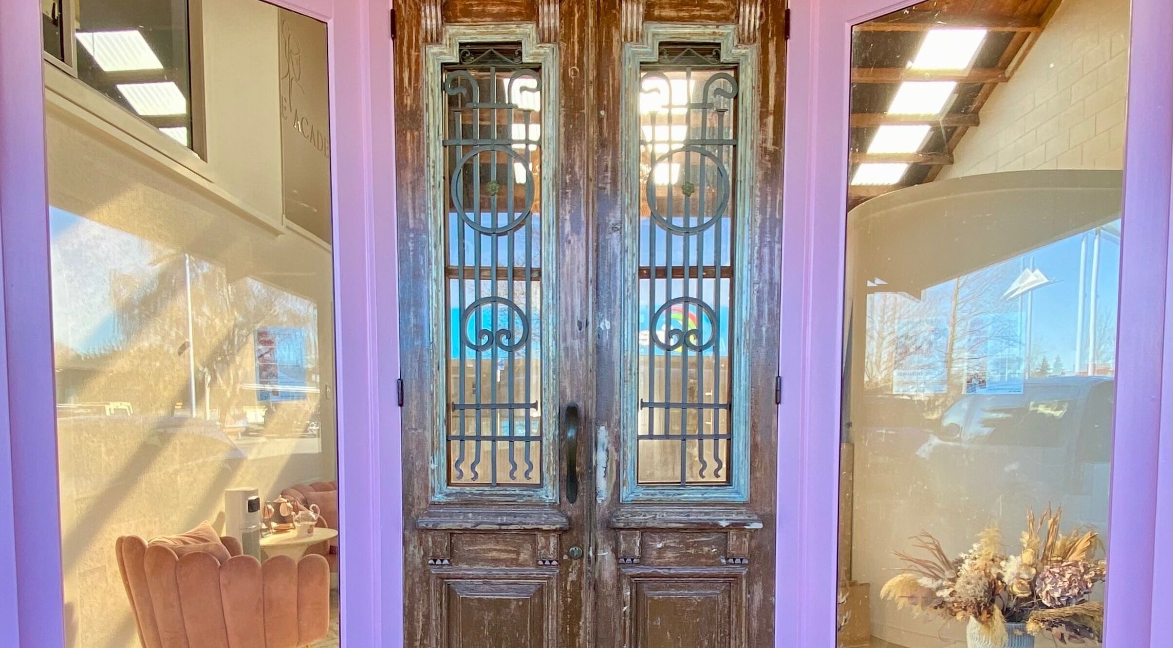 Charming double doors at ALPENGLOW BEAUTY THERAPY in Methven, Canterbury Region, NZ, welcoming guests inside.