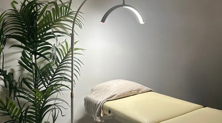 Relaxing massage table setup with soft lighting at Coleysbrows, Locking Parklands, England, GB.