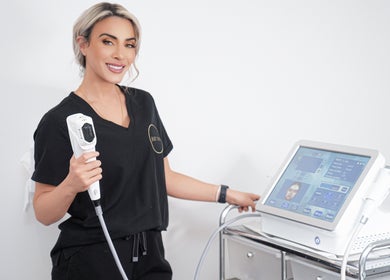 Beauty professional using advanced equipment at Just Skin Uk, Cardiff, Wales, GB.