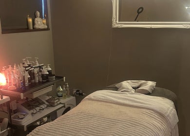Relaxing therapy room at The Ivy Rooms, Dunmow, England, GB with a massage table and calming decor.