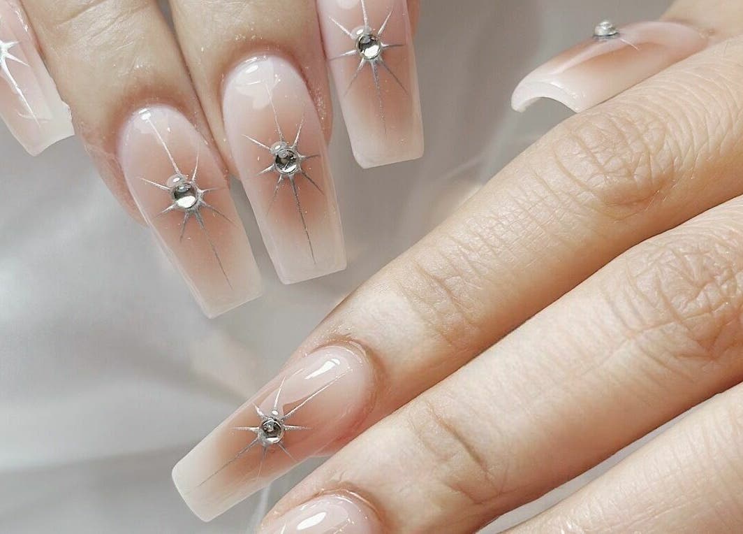 Elegant starlit nail art at Cosmo Nails & Beauty, Auckland, Auckland, NZ, showcasing intricate design.