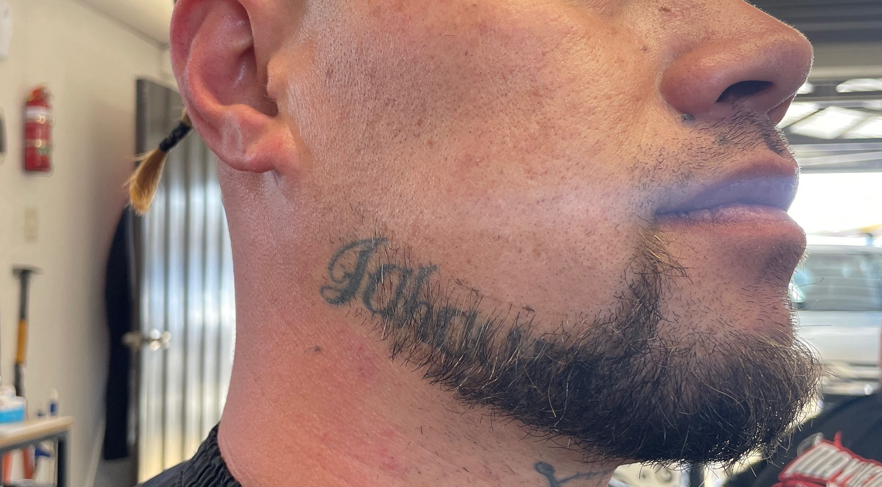 Close-up of a styled beard and neck tattoo at Itz.zaekutz03, Whanganui, Manawatū-whanganui Region, NZ.