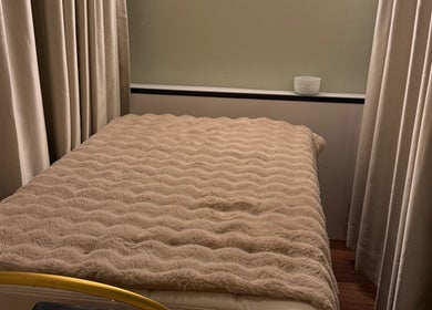 Calm massage room with soft linens at Lift Your Soul Head Spa, Stuart Park, Northern Territory, AU.