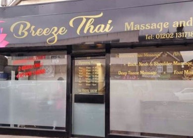 Front view of Breeze Thai Massage & Spa in Poole, England, GB with glass storefront and floral logo.