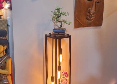 Peaceful ambiance at Breeze Thai Massage & Spa in Poole, England featuring a Buddha statue and warm lighting.