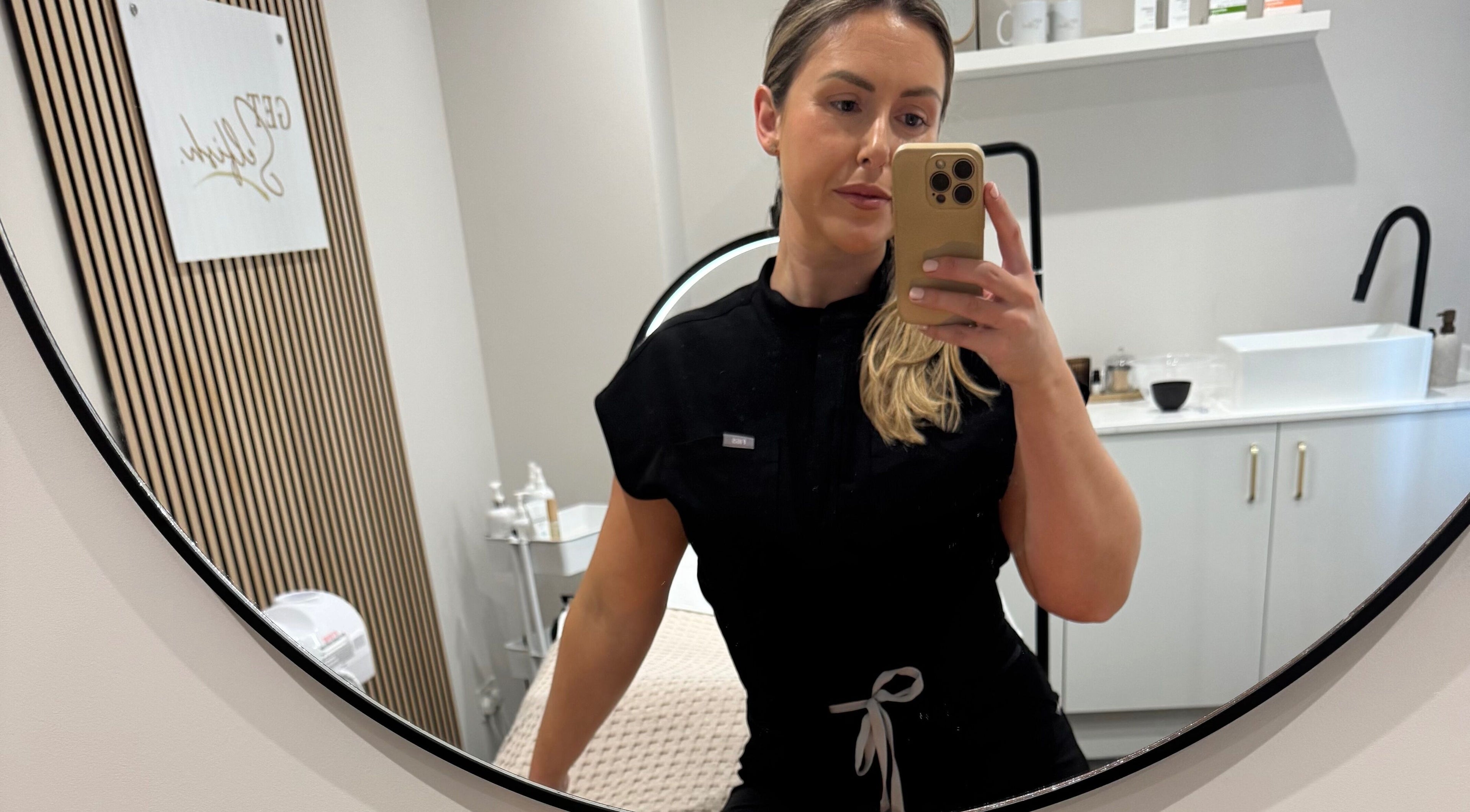 Professional at Get Selfish Skin Clinic, Stebbing, England, GB, in a calming treatment room.