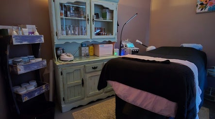 Relaxing treatment room at Treat Yourself Beautifully, Clermont, Queensland, AU with cozy bed and elegant decor.