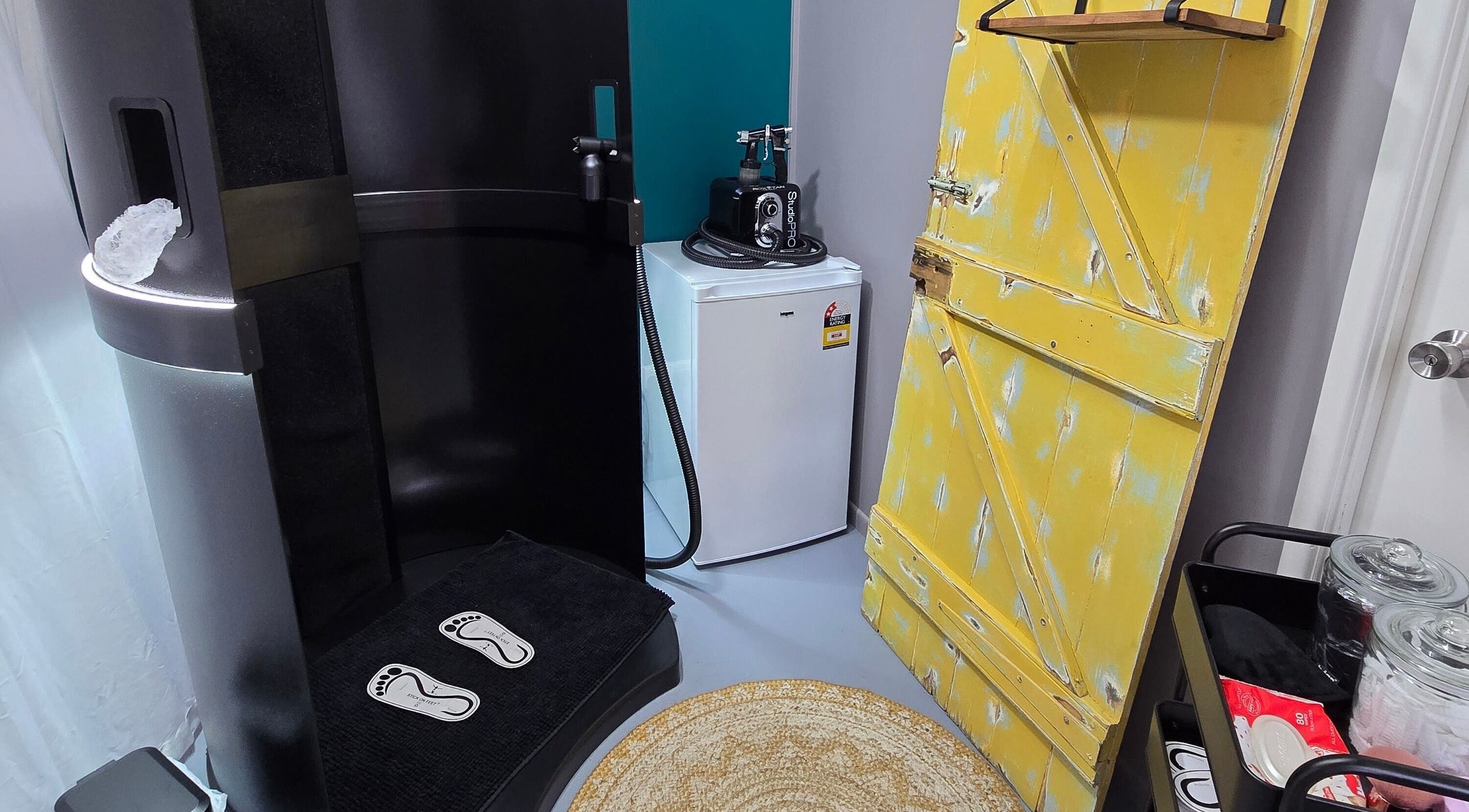 Modern wellness corner at Treat Yourself Beautifully, Clermont, Queensland, AU featuring sleek spa equipment.