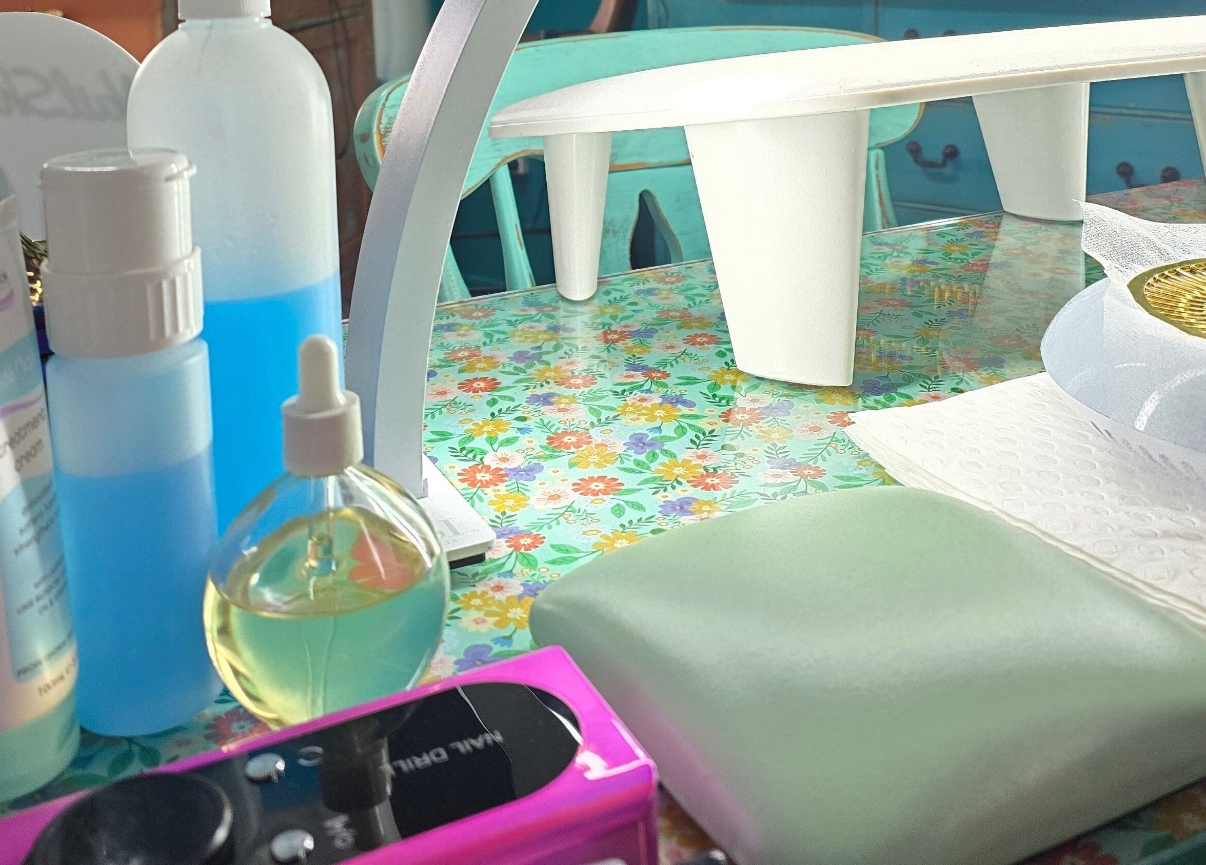 Manicure station at Treat Yourself Beautifully in Clermont, Queensland, AU. Nail tools and colorful supplies displayed.