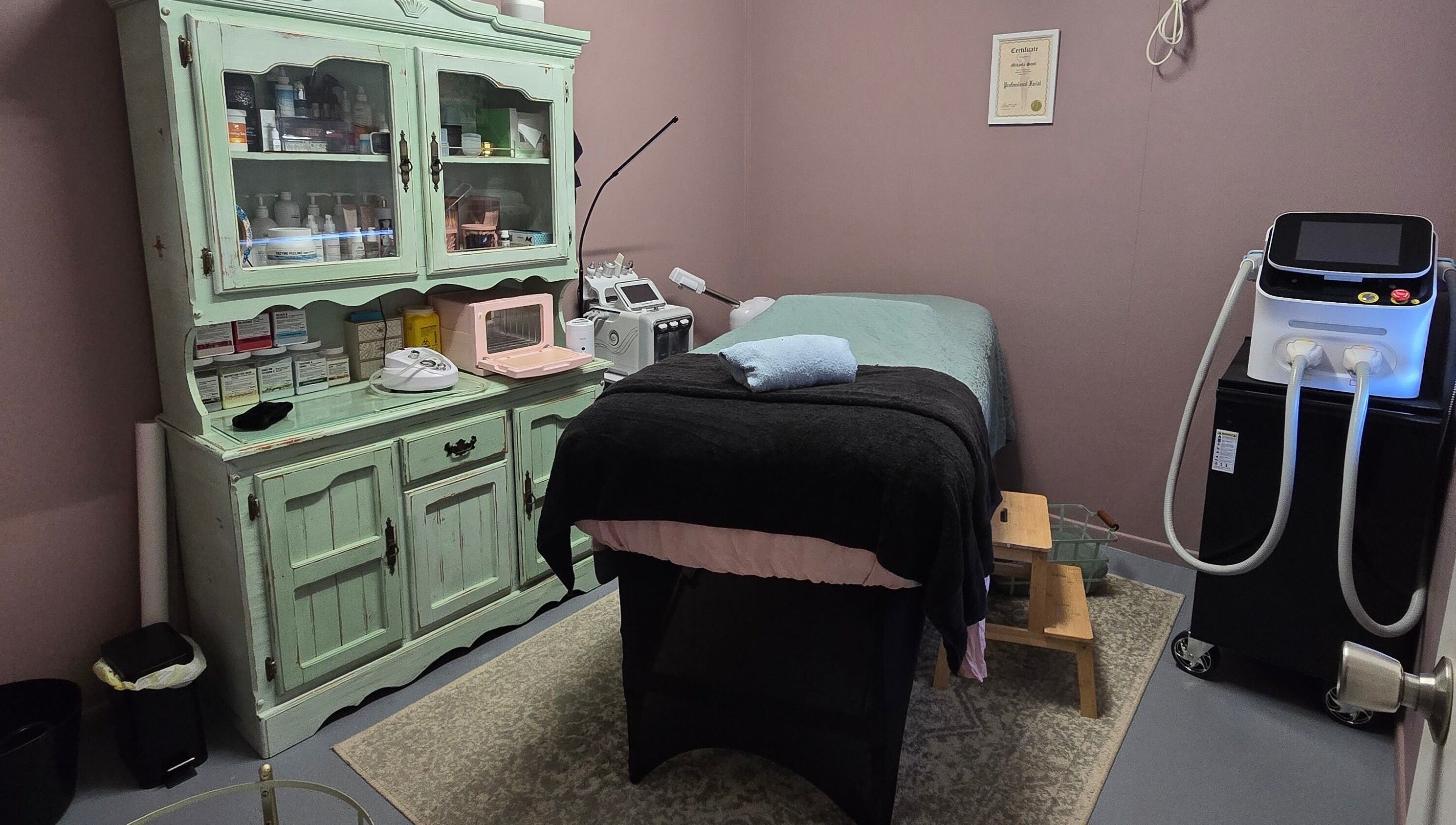 Cozy treatment room at Treat Yourself Beautifully, Clermont, Queensland, AU, featuring a relaxing bed and equipment.