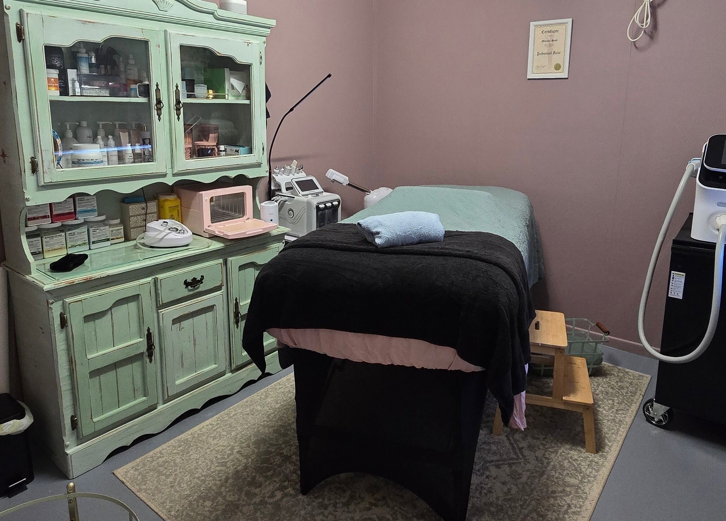 Cozy treatment room at Treat Yourself Beautifully, Clermont, Queensland, AU, featuring a relaxing bed and equipment.