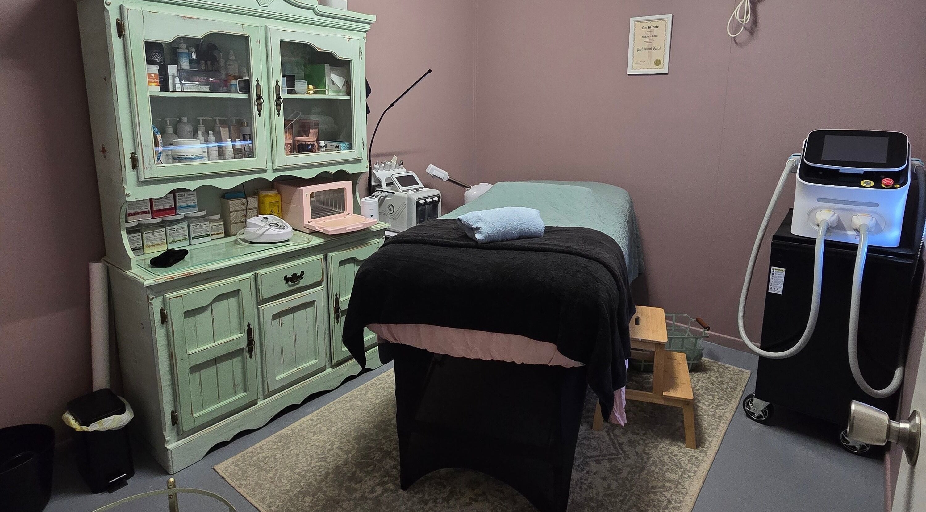 Cozy treatment room at Treat Yourself Beautifully, Clermont, Queensland, AU, featuring a relaxing bed and equipment.