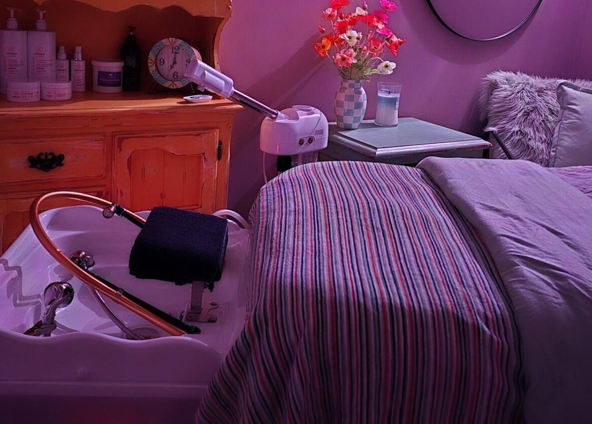 Relaxing beauty room setup at Treat Yourself Beautifully, Clermont, Queensland, AU with cozy linens and aromatherapy.