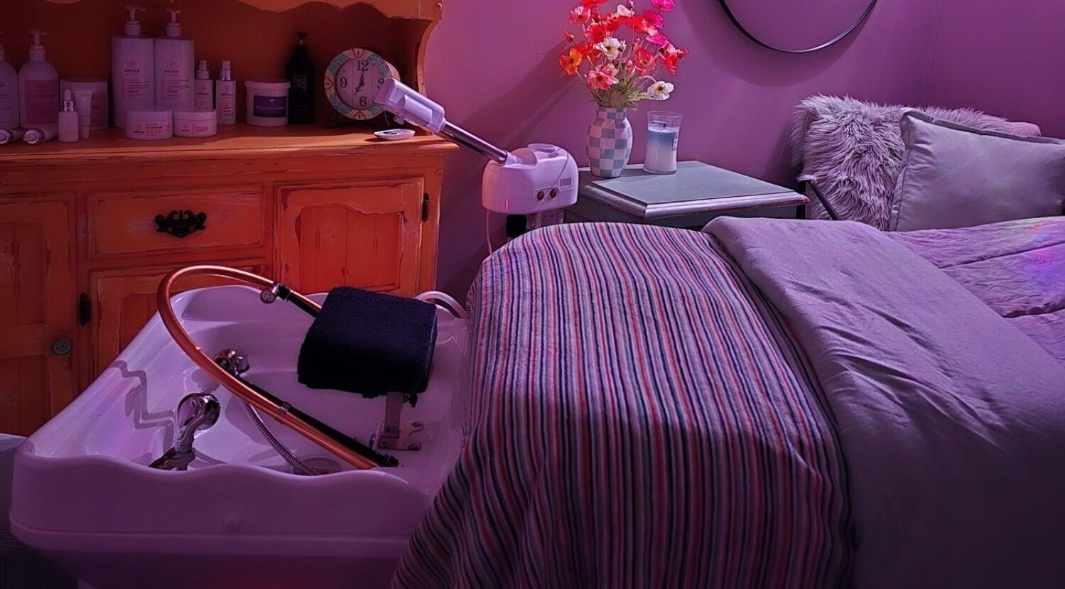 Relaxing beauty room setup at Treat Yourself Beautifully, Clermont, Queensland, AU with cozy linens and aromatherapy.