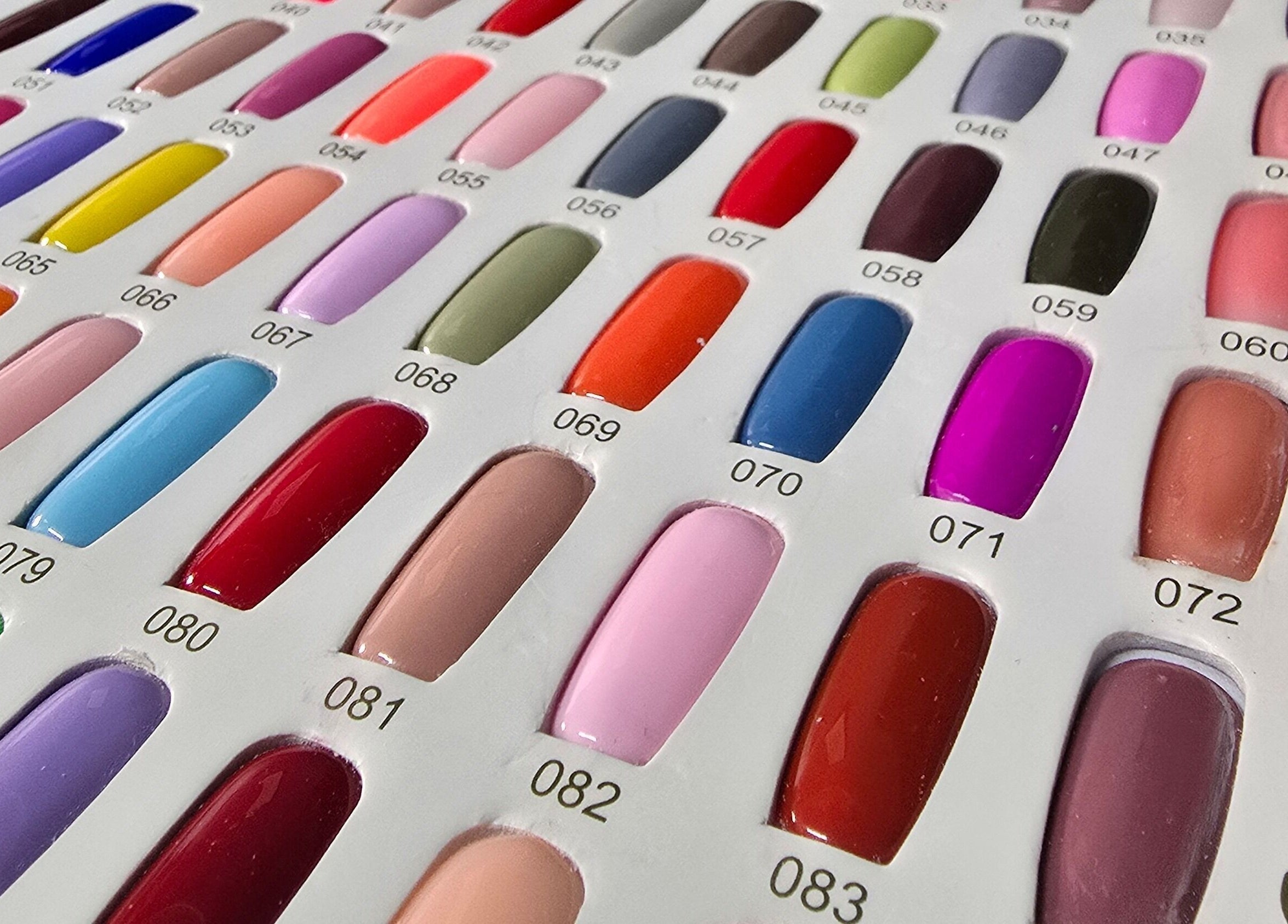 Diverse nail polish shades at Treat Yourself Beautifully, Clermont, Queensland, AU for vibrant style choices.