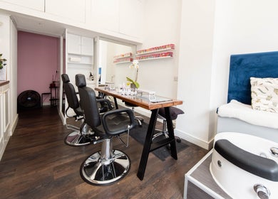 Effulgent Beauty salon interior in London, United Kingdom, offering nails, waxing, and eyelash services.