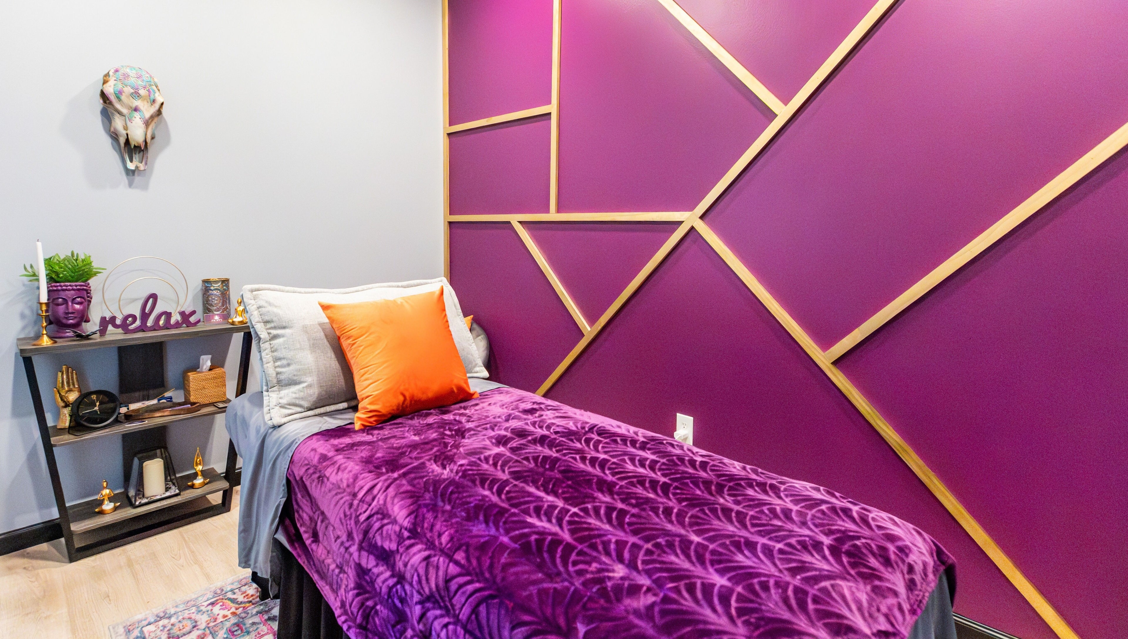 Purple-themed relaxation room at Aura Holistic and Metaphysical Wellness, Spring, Texas, US.