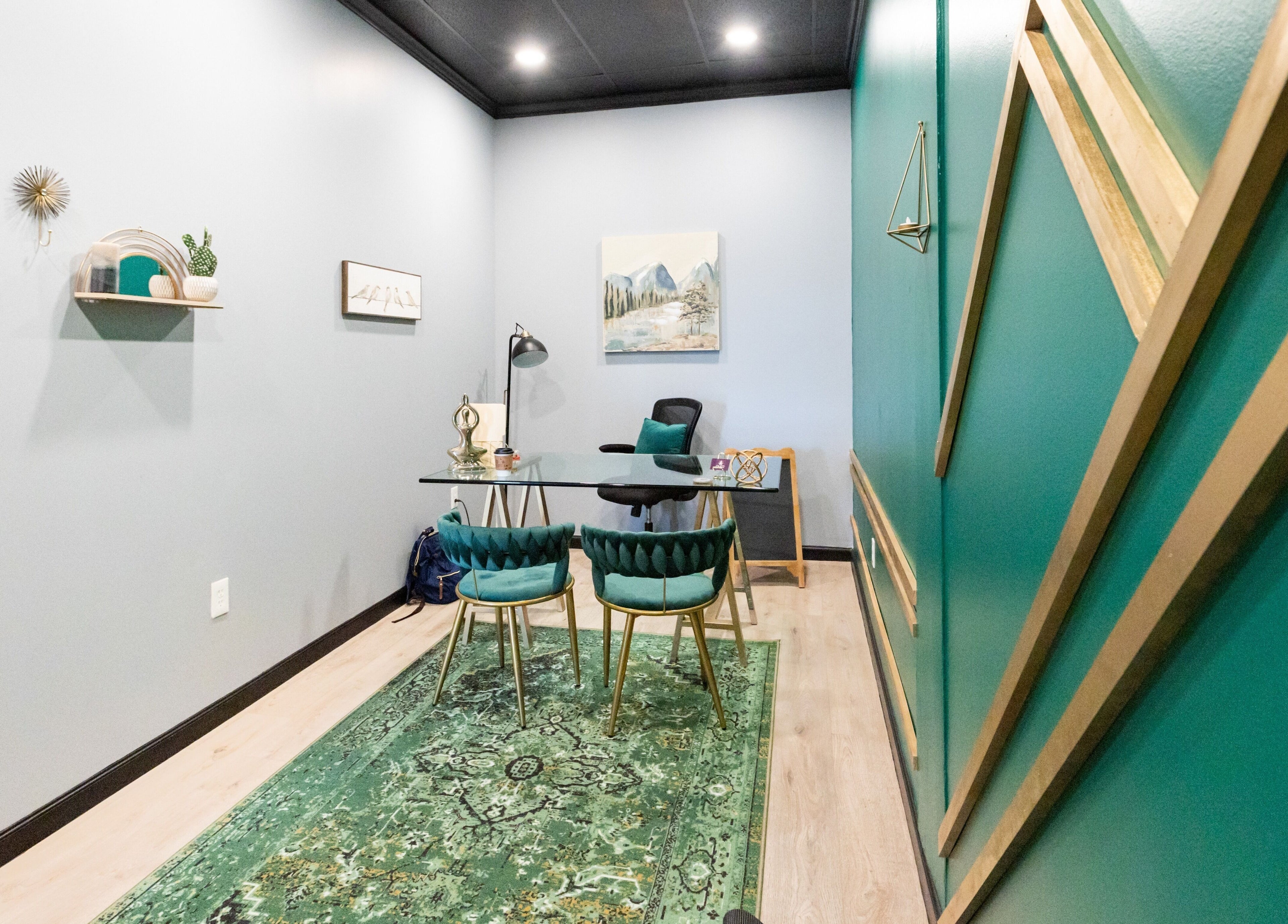 Serene office at Aura Holistic and Metaphysical Wellness, Spring, Texas, US with green decor and modern furnishings.