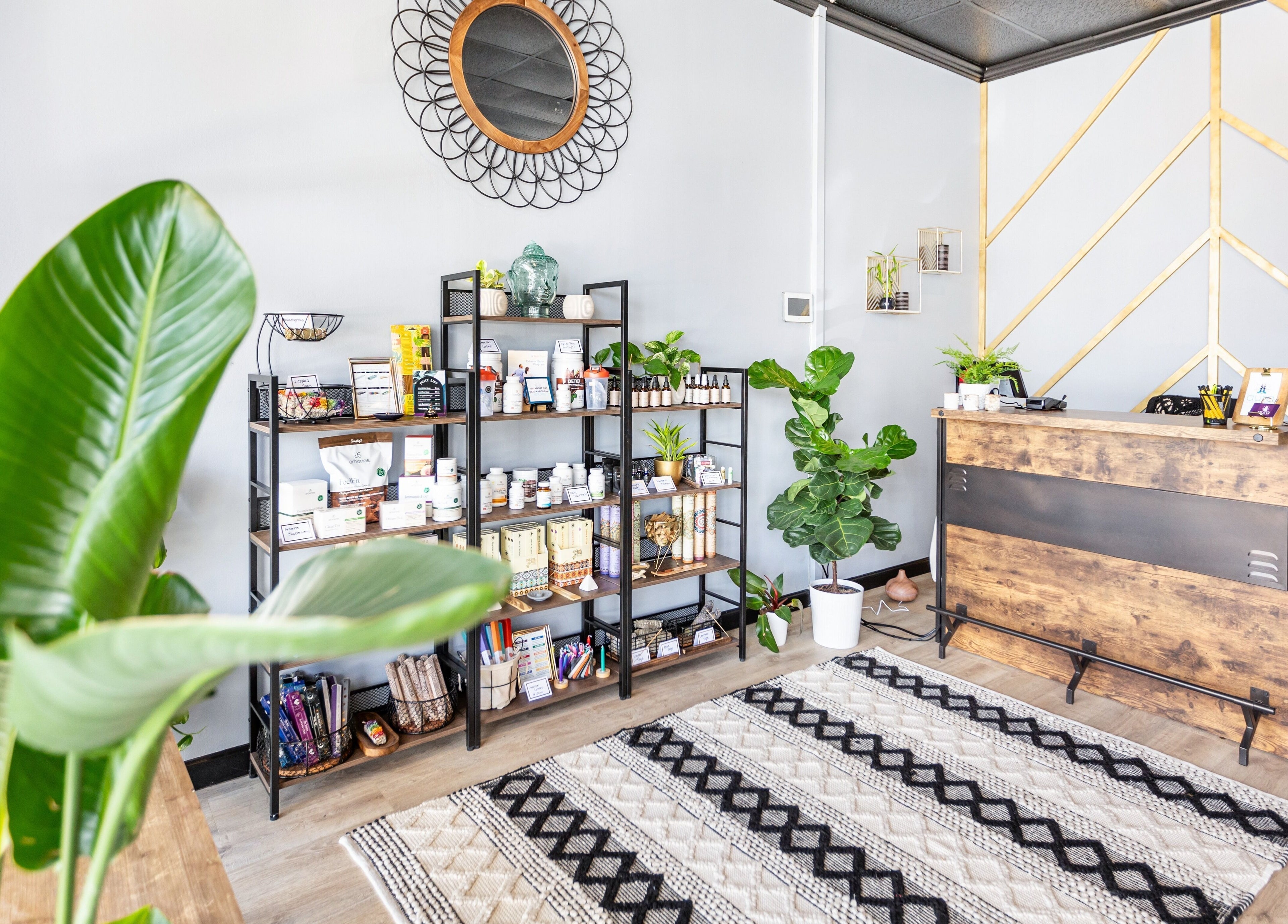 Peaceful reception area at Aura Holistic and Metaphysical Wellness, Spring, Texas, US, displaying wellness products.