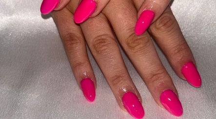 Bright fuchsia manicure at The Hair & Beauty Hub, Bargeddie, Scotland, GB