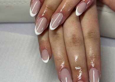 Elegant French manicure at The Hair & Beauty Hub, Bargeddie, Scotland, GB.