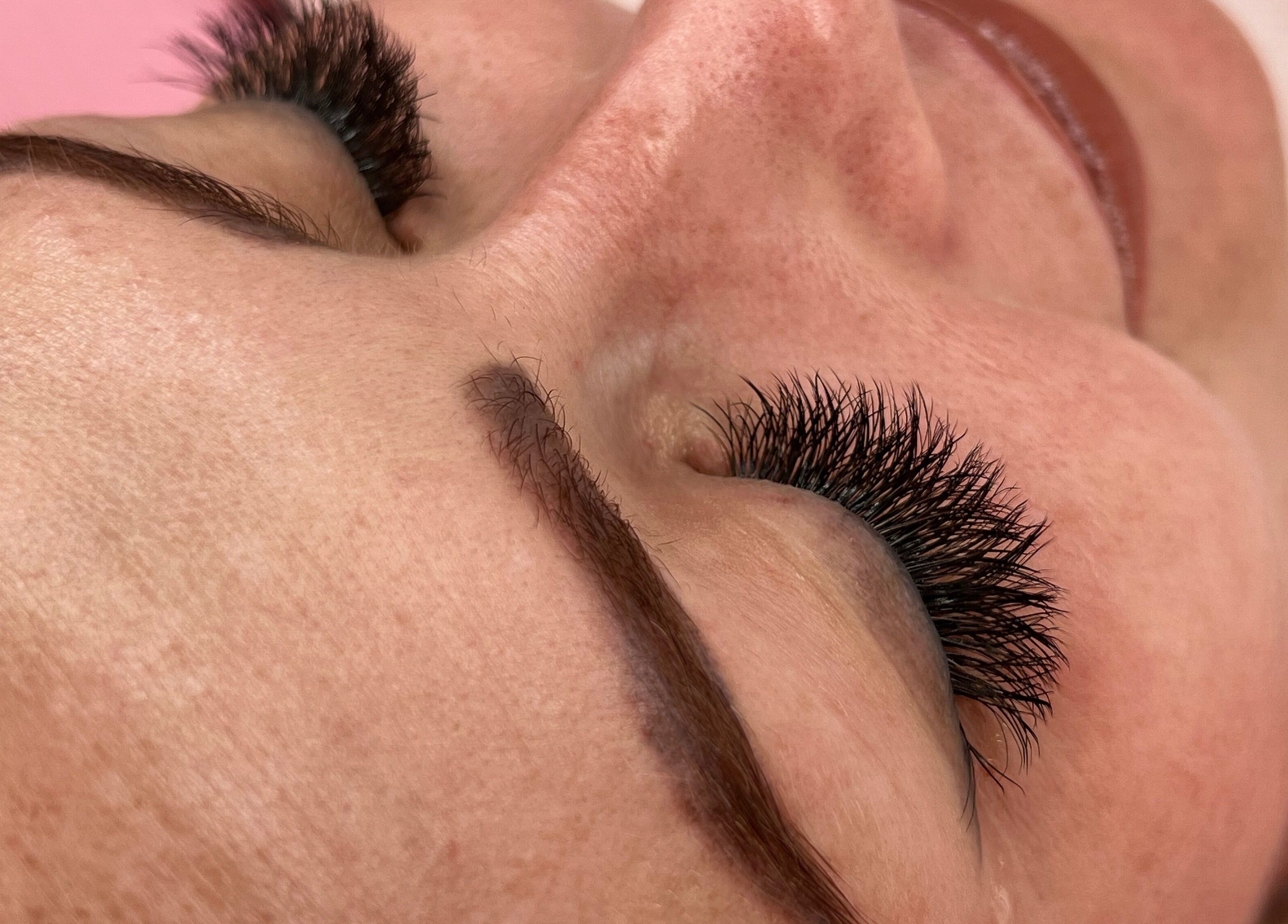 Close-up of eyelash extensions at iLash Artistry, Benoni, Gauteng, ZA showcasing natural look and precision.