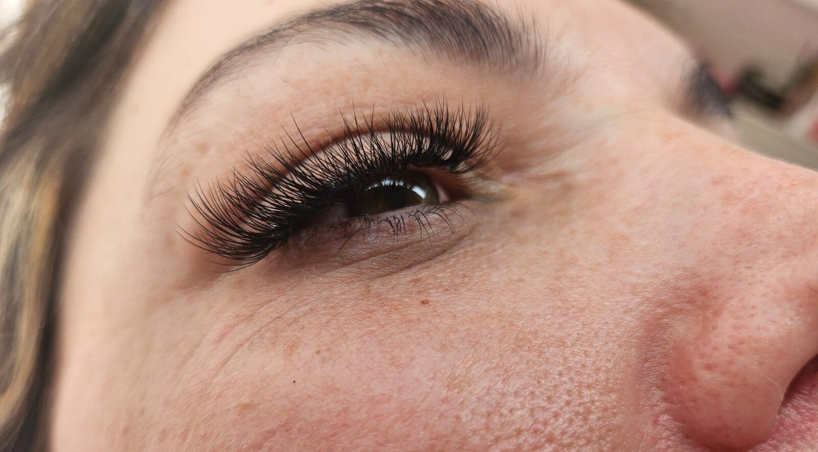 Closeup of expertly applied eyelash extensions at iLash Artistry, Benoni, Gauteng, ZA.
