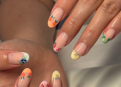 Vibrant nail art at Gels By Kayles showcases colorful designs in Taunton, England, GB.