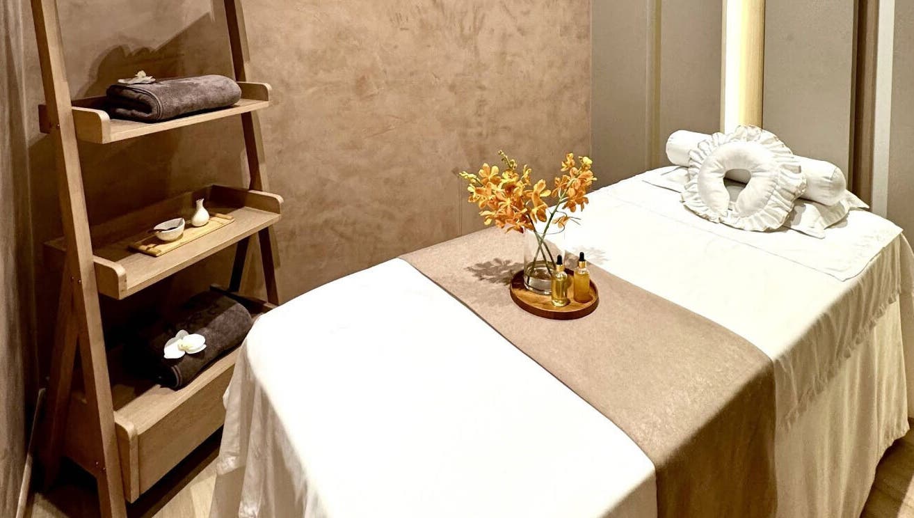 Relaxing massage room at JM Beauty Studio in Kuala Lumpur, MY, featuring a massage bed and calming decor.