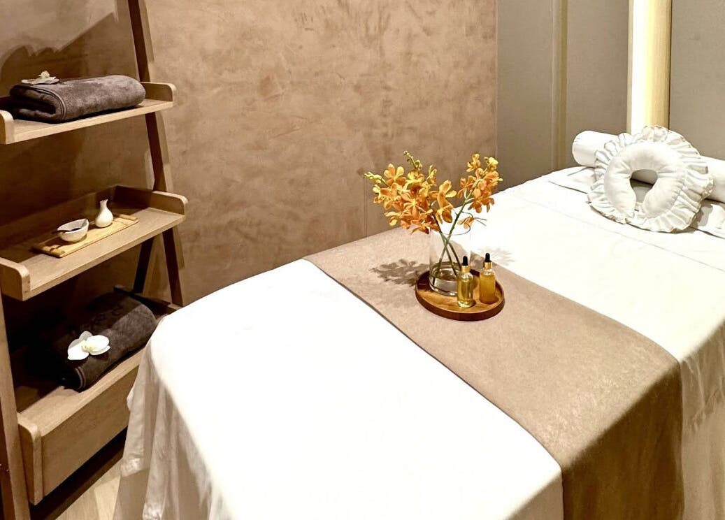 Relaxing massage room at JM Beauty Studio in Kuala Lumpur, MY, featuring a massage bed and calming decor.