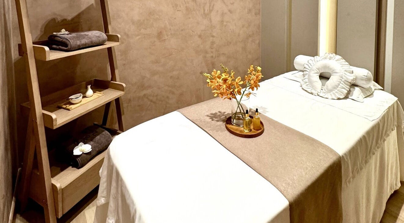 Relaxing massage room at JM Beauty Studio in Kuala Lumpur, MY, featuring a massage bed and calming decor.