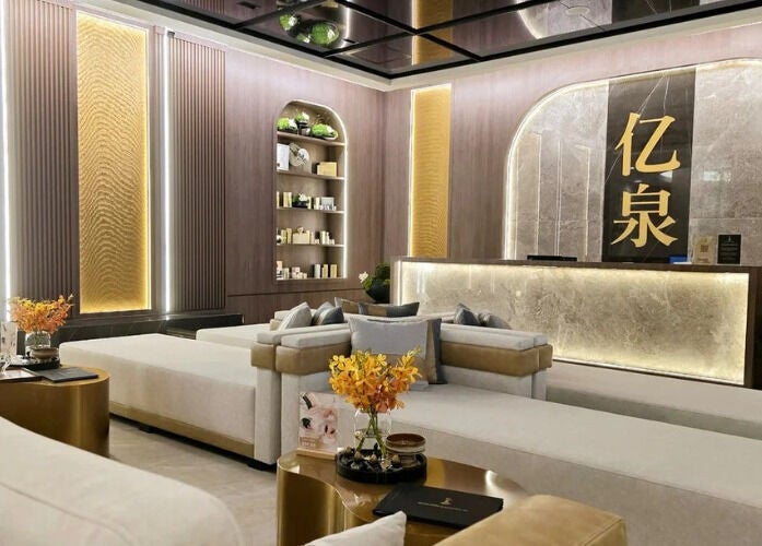 Luxurious reception area of JM Beauty Studio, Kuala Lumpur, featuring plush seating and elegant decor.