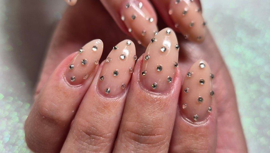 Elegant nail art with gems at Mooi Getooi in Douglas, Northern Cape, ZA.